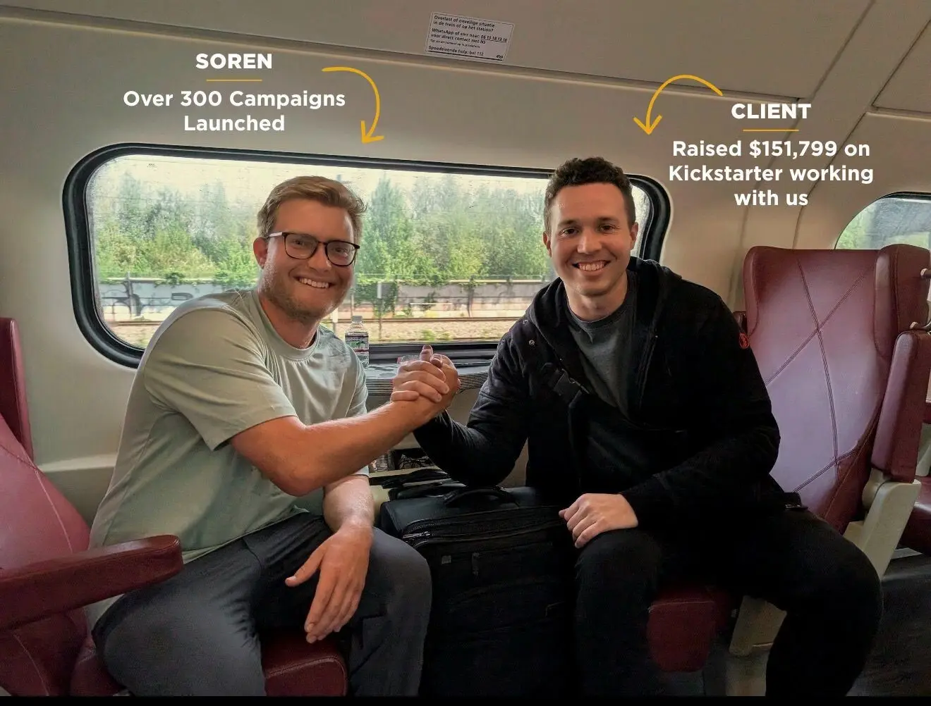 Soren, who has launched over 300 campaigns, shaking hands on a train with a client who raised $151,799 on Kickstarter