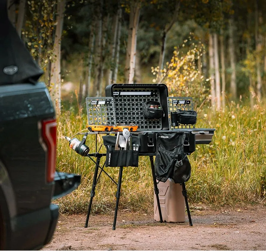 The Dialed Camp Kitchen set up at a campsite