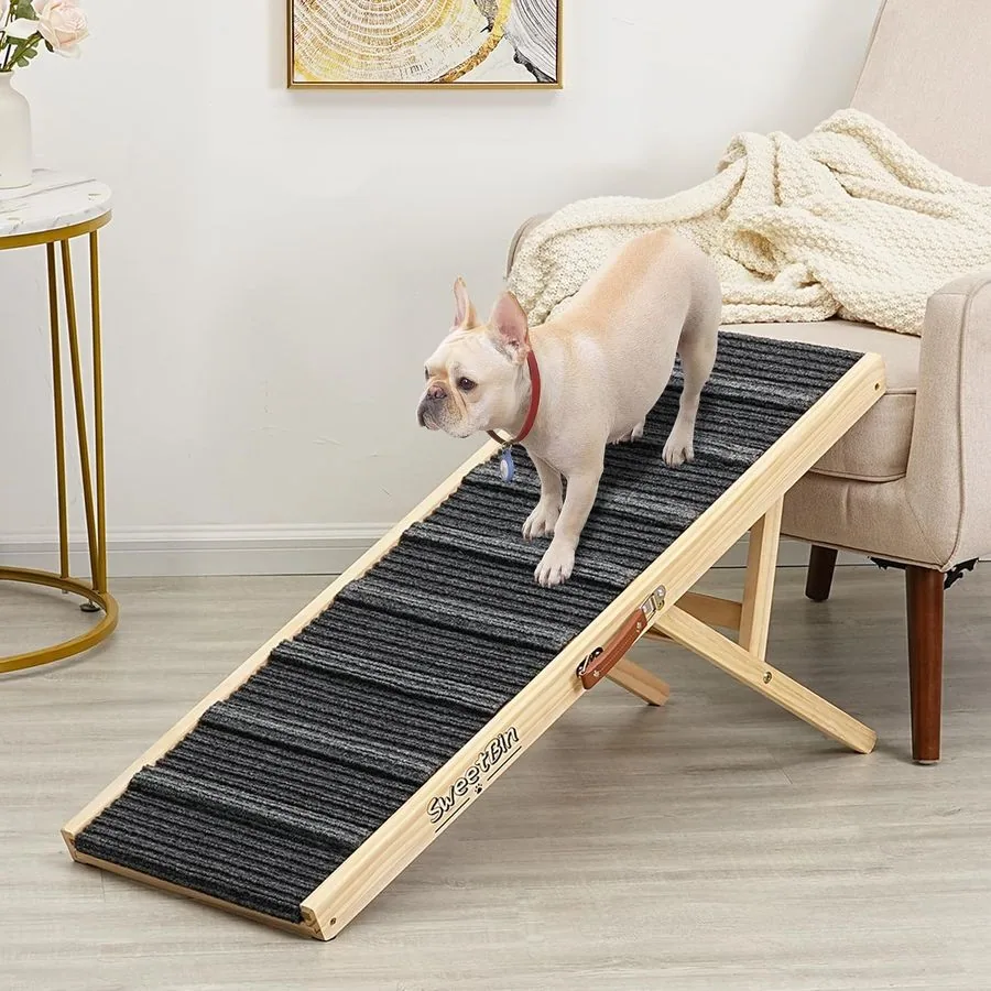 A dog climbing the SeatMate ramp onto a sofa