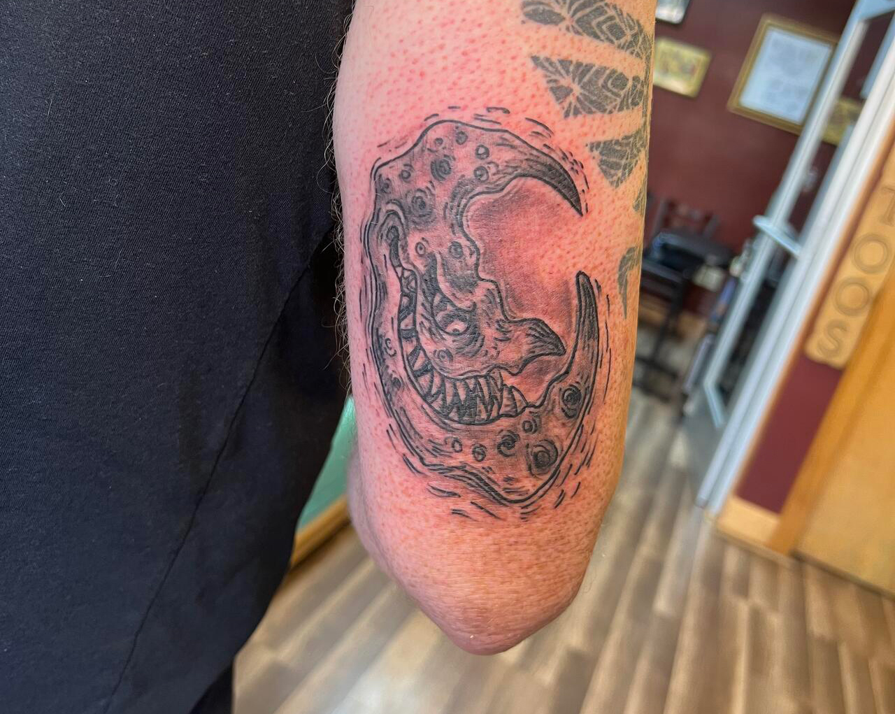 Spencer Crooked Moon Tattoo