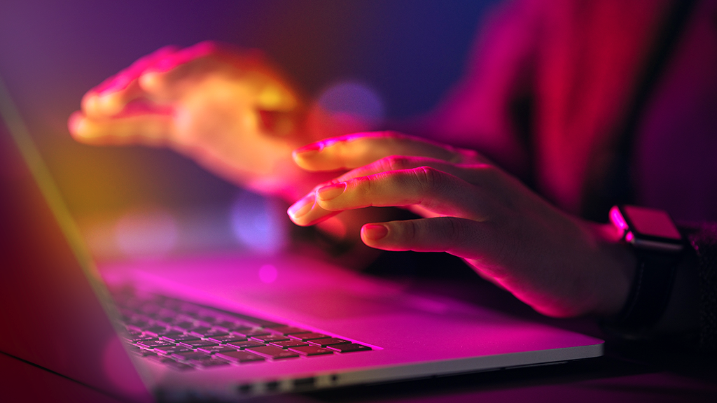 Hands poised over a glowing keyboard. The image is titled 1 best crowdfunding sites for technology