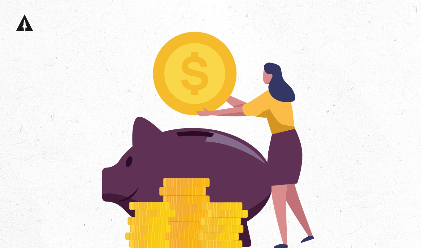 woman dropping coin in piggy bank